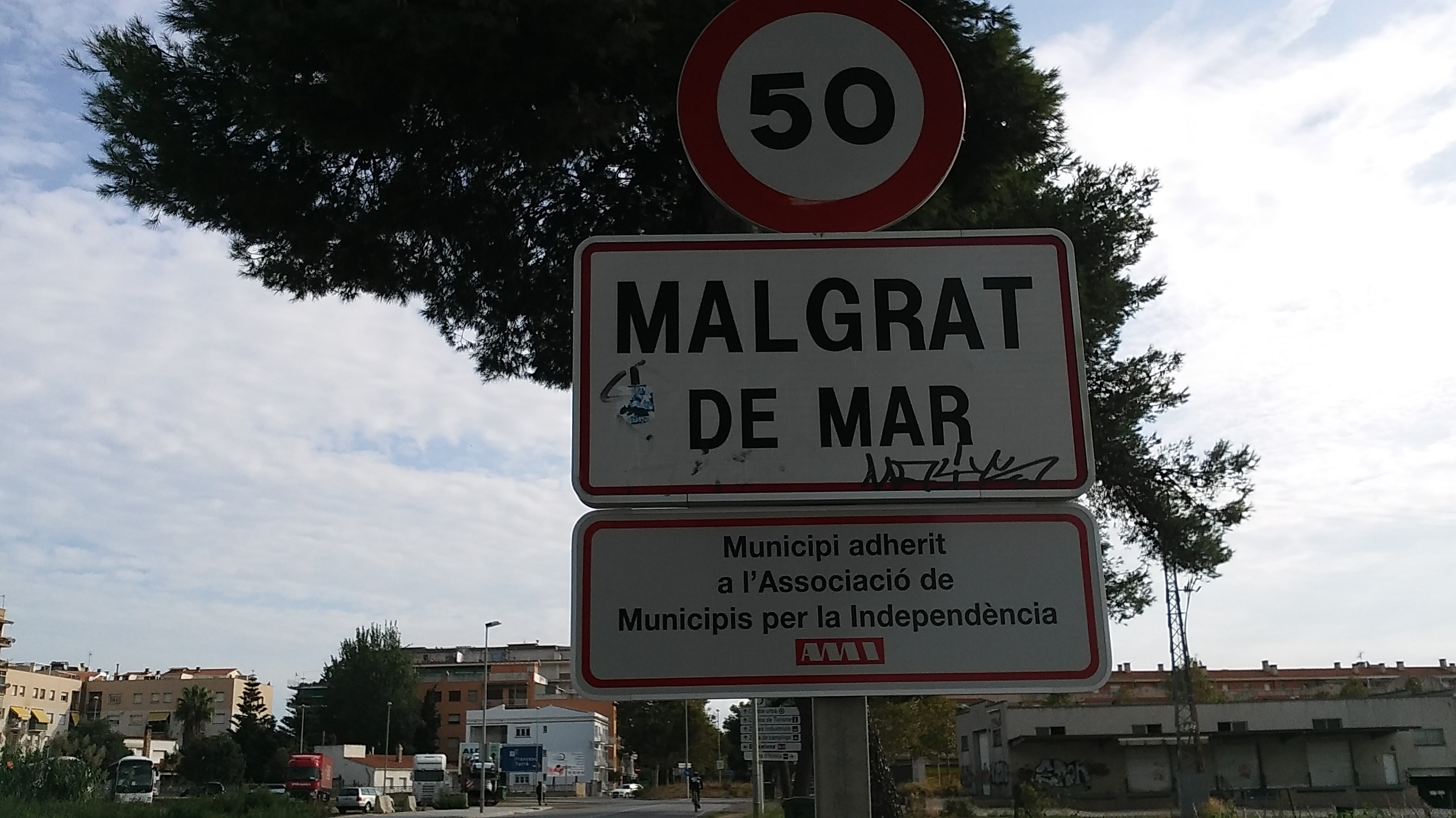 Cartell d'adhesió de Malgrat de Mar a l'AMI. El Malgratenc